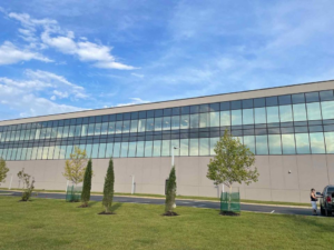 Commercial window tinting installed on modern office building glass facade