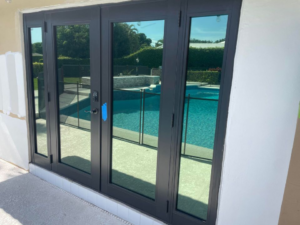 Heat reduction window film applied on glass to block infrared heat, reduce glare, and filter UV rays for better indoor comfort.